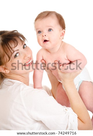 mother holding baby