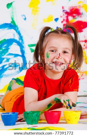 Junior student drawing with her fingers