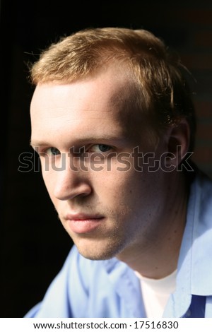 natural light portrait of attractive man with thinning hair