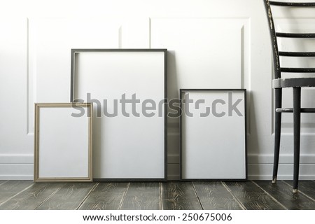 mockup of blank three frame poster on the floor