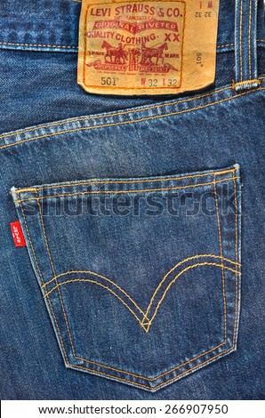 SYDNEY, AUSTRALIA - April 6,2015 : Close up of the LEVI\'S red label on the back pocket of denim jeans. LEVI\'S is a brand name of Levi Strauss and Co, founded in 1853.