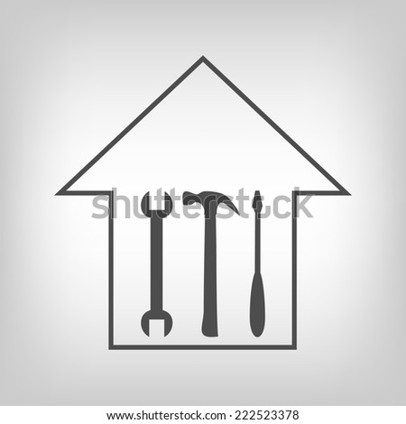 House repair sign. House silhouette with hammer, screwdriver and spanner