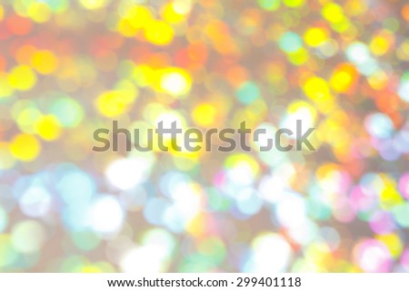 Circles or lights as an abstract bright blurry varicolored background, texture, in motion, movement, sparkling