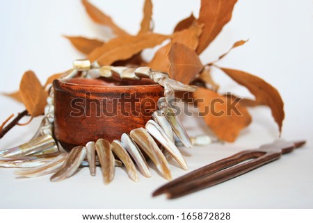 coral necklace in wooden bowl