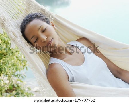 Beautiful black woman relaxing at spa