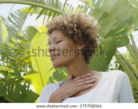 Beautiful black woman in nature