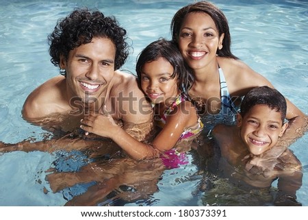 Happy family at pool