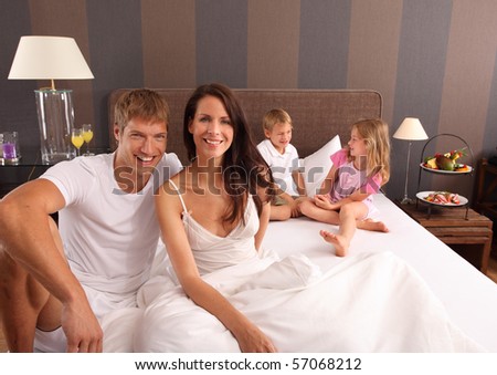 family in bed - good morning