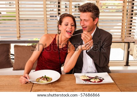 couple feeding each other - dessert - food