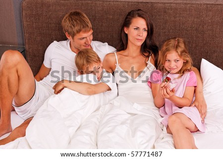 good morning - family in bed