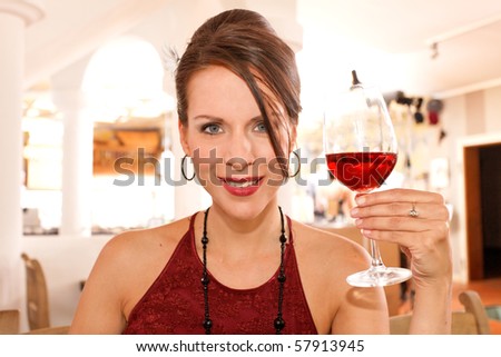 cheers - pretty woman with a glass of wine