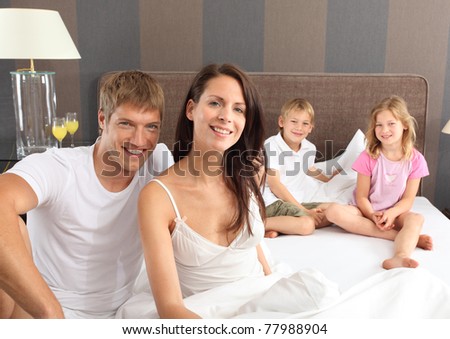 good morning - family in bed