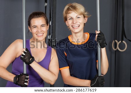 sports woman barbell training with plastic bar