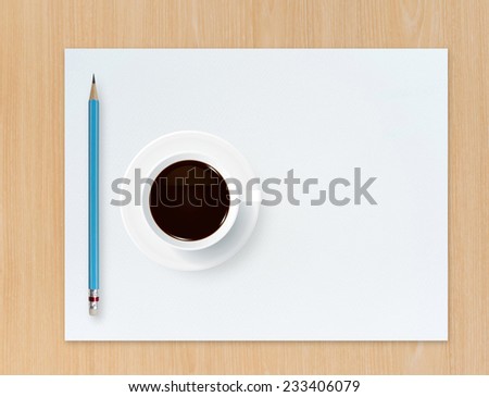Cup of coffee, pencil and white paper on wooden background. Abstract background for painting, drawing and sketching.