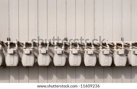 Row of Gas Meters On a Wall