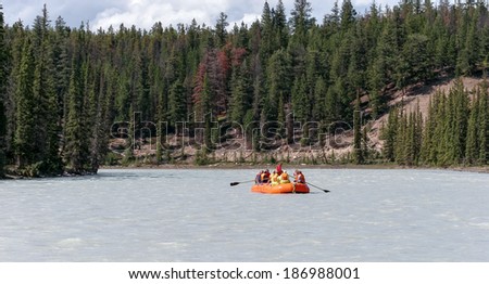 JASPER, ALBERTA/CANADA - AUGUST 9 : Whitewater rafting on the Athabasca river flowing down to Jasper on August 9, 2007. Unidentified people.