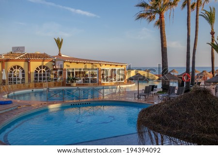 CALAHONDA, ANDALUCIA/SPAIN - MAY 8 : Evening sunshine at Dona Lola holiday resort in Calahonda Spain on May 8, 2014. Unidentified people.
