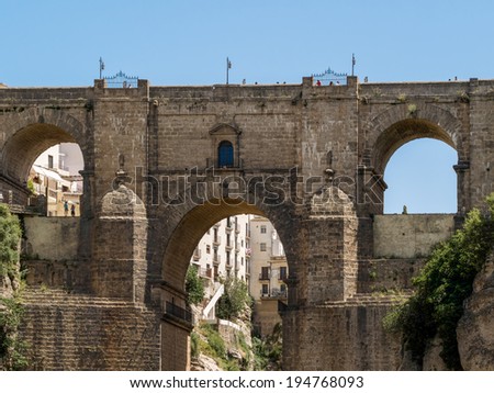 RONDA, ANDALUCIA/SPAIN - MAY 8 : View of the New Bridge in Ronda Spain on May 8, 2014. Unidentified people