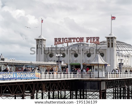 BRIGHTON, EAST SUSSEX/UK - MAY 24 : View of Brighton Pier in Brighton East Sussex on May 24, 2014. Unidentified people.