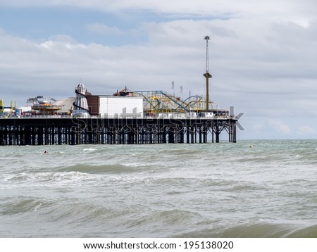 BRIGHTON, EAST SUSSEX/UK - MAY 24 : View of Brighton Pier in Brighton East Sussex on May 24, 2014. Unidentified person.