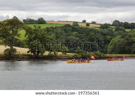 TOTNES, DEVOV/UK - JULY 29 : Pirates on the River Dart near Totnes on July 29, 2012. Unidentified people.