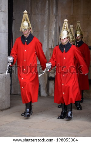 LONDON - MARCH 6 : Lifeguards of the Queens Household Cavalry on duty in London on March 6, 2013. Unidentified men.