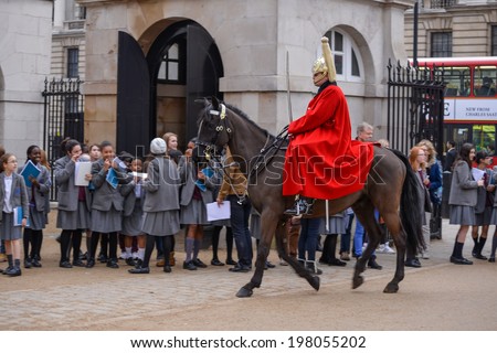 LONDON - MARCH 6 : Lifeguard of the Queens Household Cavalry on duty in London on March 6, 2013. Unidentified people.