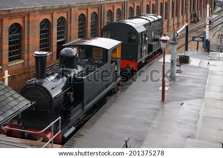SHEFFIELD PARK, EAST SUSSEX/UK - SEPTEMBER 8 : Two old trains parked at Sheffield Park station East Sussex on September 8, 2013