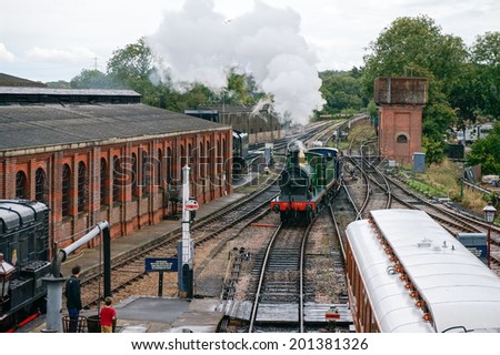 SHEFFIELD PARK, EAST SUSSEX/UK - SEPTEMBER 8 : C Class steam engine at Sheffield Park station East Sussex on September 8, 2013. Unidentified people.