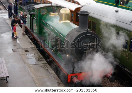 SHEFFIELD PARK, EAST SUSSEX/UK - SEPTEMBER 8 : C Class steam engine at Sheffield Park station East Sussex on September 8, 2013. Unidentified people.