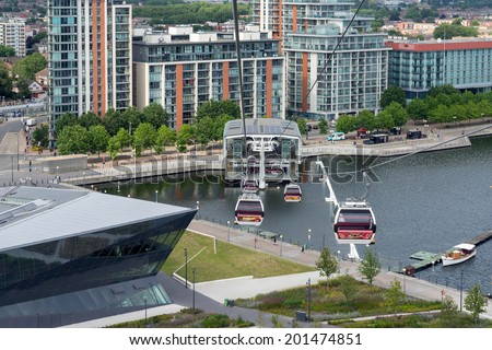 LONDON - JUNE 25 : View of the London cable car over the River Thames in London on June 25, 2014. Unidentified people.