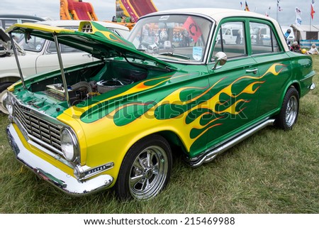 SHOREHAM-BY-SEA, WEST SUSSEX/UK - AUGUST 30 : Souped up Vauxhall Victor with special paintwork parked on Shoreham Airfield in West Sussex on August 30, 2014. Unidentified people.