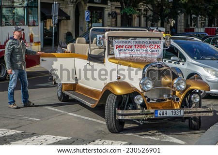 PRAGUE, CZECH REPUBLIC/EUROPE - SEPTEMBER 24 : Sightseeing tours by custom car in Prague on September 24, 2014. Unidentified man.