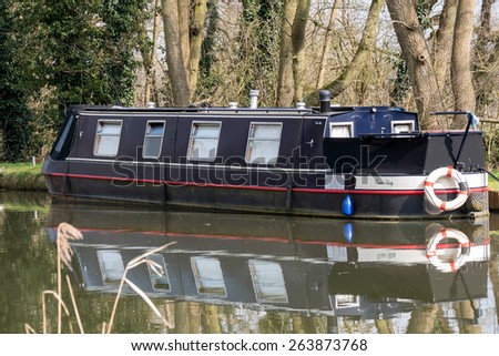 SEND, SURREY/UK - MARCH 25 : Narrow Boat on the River Wey Navigations Canal at Send in Surrey on March 25, 2015