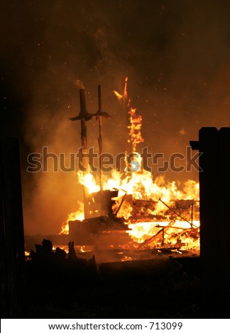 crosses burning in fire