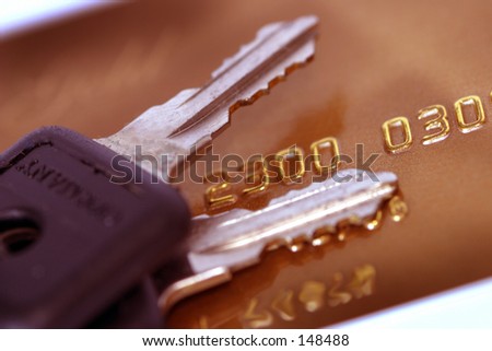 Photo of a credit card with keys.