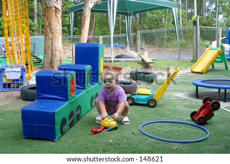Photo of a young girl at a child care center.