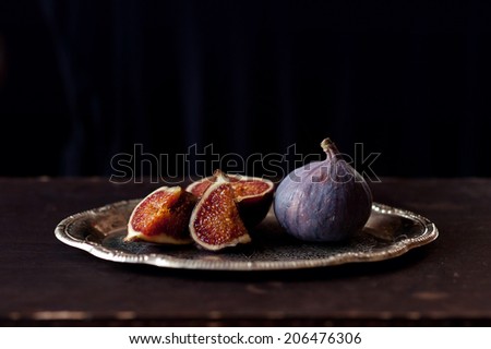 Plate with Figs  on dark background
