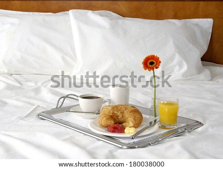 Breakfast in bed at hotel room