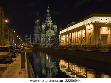 The night canal and church (the Cathedral of the Resurrection of Christ a.k.a. Church of the Savior on Spilled Blood) in winter St. Petersburg, Russia