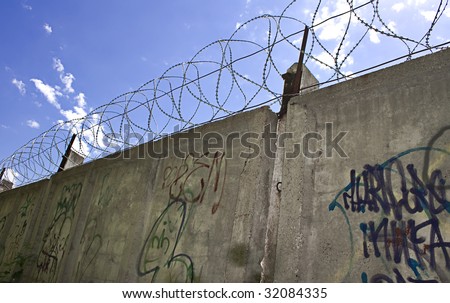 Barbed wire wall