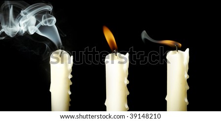 Candles isolated on black background