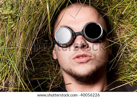 Klados Stock-photo-bald-man-in-grass-stare-to-all-of-you-through-round-glasses-think-about-it-40056226