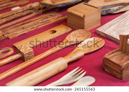 Handmade kitchen utensils made of olive wood on the feast of the reconquest of 2015 Vigo, Spain.
