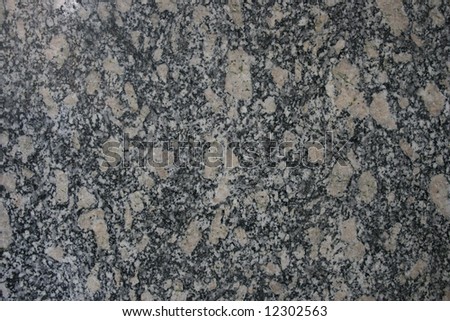 White and black granite marble texture closeup.