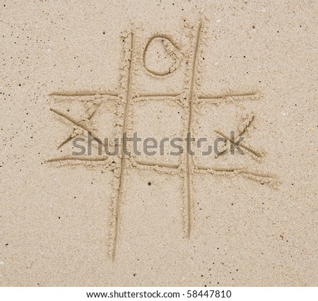 X and O game on the sand
