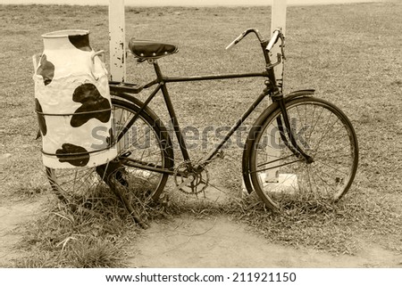 bicycle with steel milk container at the back, Old style