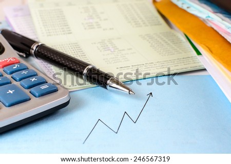 Account book with Calculator and documents. Finance and business graph