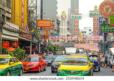 BANGKOK, THAILAND - FEBRUARY 1, 2015: street scene and traffic in Chinatown on February 1, 2015 in Bangkok. Chinatown, Its a famous tourist attraction