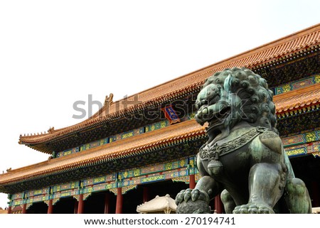Copper lion in front of an ancient architecture in Forbidden city, Beijing China